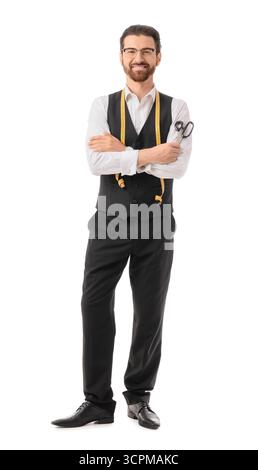 Male tailor with scissors on white background Stock Photo