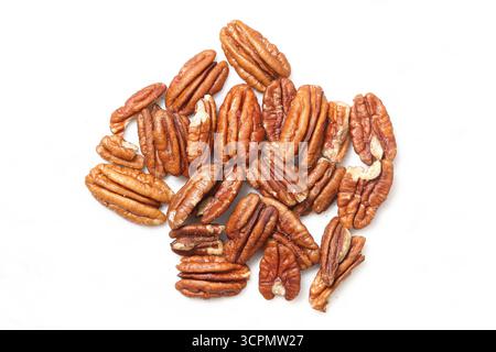 Pecan nuts isolated on white background. Healthy natural food rich in nutrients. Organic snack ingredient for cooking, baking, and diet. Stock Photo