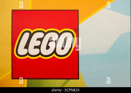 Close-up of LEGO logo on colorful packaging symbolizing creativity and toy brand identity Stock Photo