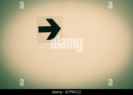 dame 50 tags for this, exit sign on the wall Stock Photo