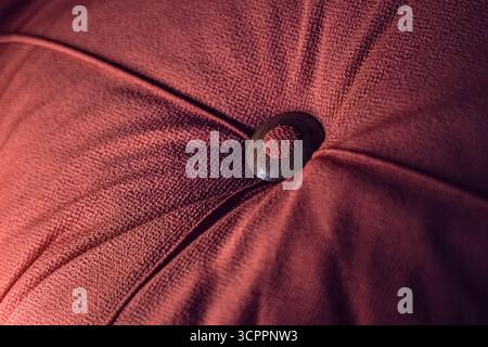 Close-up detail photo of luxury furniture. The material highlight the craftsmanship, making this image ideal for interior design and home decor themes. Stock Photo