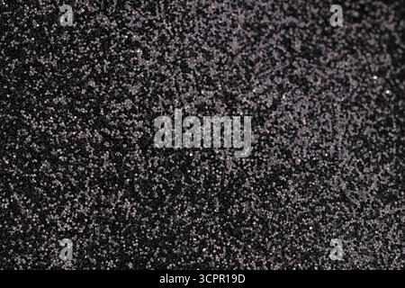 Close Up Black Glitter Texture Stock Photo