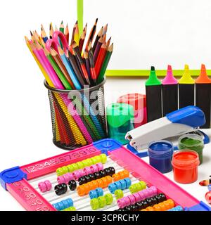 Collection of school supplies, isolated on pure white background. Stock Photo
