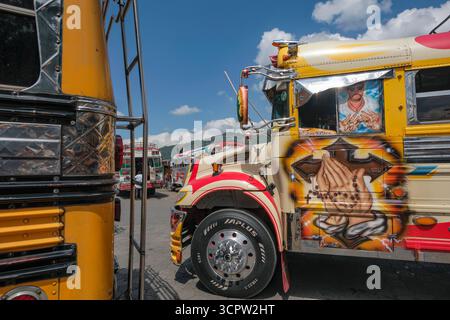 Antigua Guatemala, Guatemala - August 9, 2025: Chicken bus, a typical Central American passenger bus, at the Antigua Guatemala bus station, Guatemala. Stock Photo