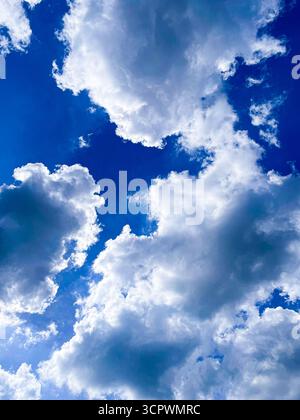 dramatic sky with thick clouds against blue sky Stock Photo