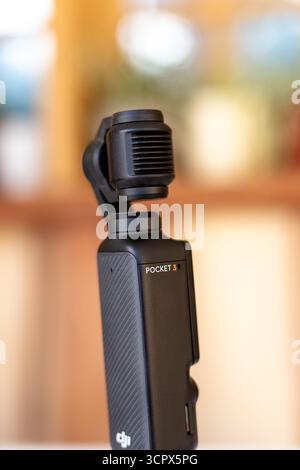 Close-Up of DJI Pocket 3 Handheld Gimbal Camera with Lens Stock Photo