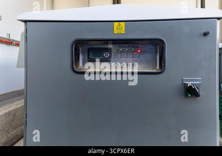 heat exchanger control panel, in metal box with clear window, switch and thermometer control panel metal shield box cabinet, Stock Photo