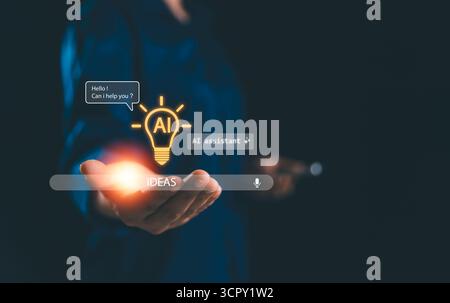 Innovative AI assistant concept with glowing light bulb idea icon above human hand, symbolizing creativity, technology, smart solutions and futuristic Stock Photo