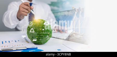 Businessman planning sustainable strategy with green energy and carbon reduction concept. Renewable energy, ESG, eco friendly innovation, and environm Stock Photo
