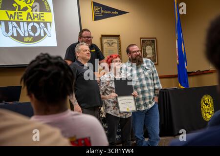 Little Canada, Minnesota. Student showing diploma to the graduating class at the Finishing Trades Academy which is a unique opportunity for high schoo Stock Photo