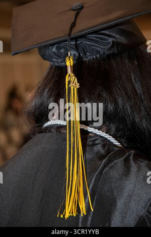 Brooklyn Center, Minnesota. Paladin Career and Technical High School. Closeup of student on graduation day ceremonies wearing her cap and gown. Stock Photo