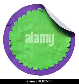 A sale price tag paper sticker featuring a purple circle with a green wavy-edge circle inside. Stock Photo