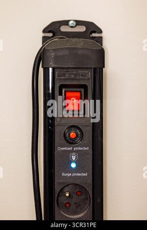 Power extension strip with switch and protection Stock Photo