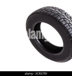 Winter tire designed for enhanced grip and safety on snowy roads during cold weather Stock Photo