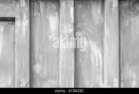Close-up view of gray painted metal surface, showcasing visible brushstrokes and texture. Perfect for design projects or as a background Stock Photo