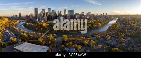 Calgary, Alberta - September 27, 2025: Aerial photograph of Calgary's downtown along the Bow River on a beautiful autumn evening. Stock Photo