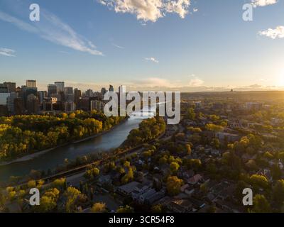 Calgary, Alberta - September 27, 2025: Aerial photograph of Calgary's downtown along the Bow River on a beautiful autumn evening. Stock Photo