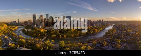 Calgary, Alberta - September 27, 2025: Aerial photograph of Calgary's downtown along the Bow River on a beautiful autumn evening. Stock Photo