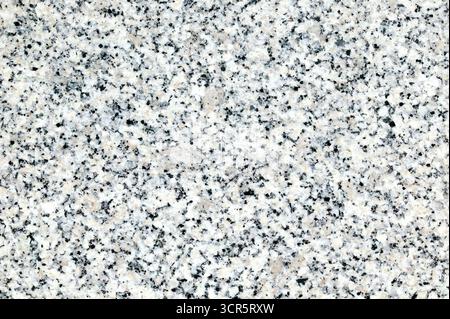 Close-up of a polished grey granite flat surface stone slab texture background, textured abstract rock backdrop stock photo image Stock Photo