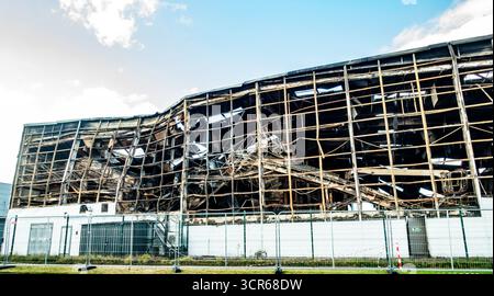 Thorntons Recycling Centre Park West Dublin, Ireland, destroyed by fire on 20 September 2025, showing severe structural damage. Stock Photo