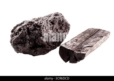pile of coal dust isolated with piece of charcoal on white background Stock Photo
