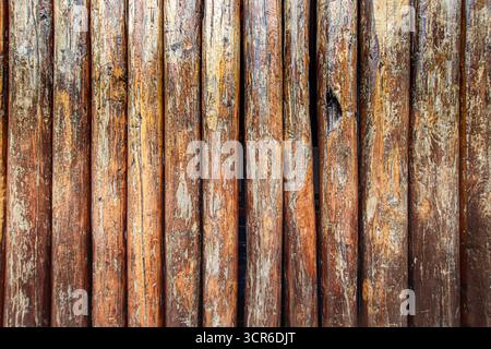 Horizontal rustic wooden wall background, weathered planks with cracks and natural patterns, perfect for abstract design and textured layouts. Stock Photo