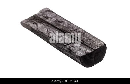 pile of coal dust isolated with piece of charcoal on white background Stock Photo