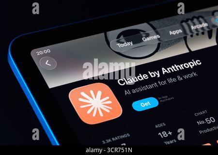Claude by Anthropic product screen on iPad, Apple Liquid Glass design under iOS 26 with updated icon and ratings. Stafford, United Kingdom, September Stock Photo