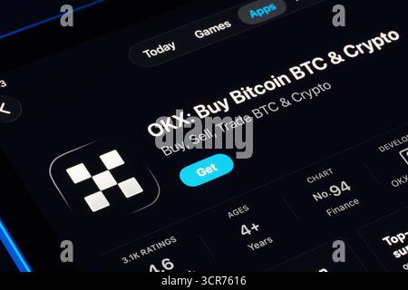 OKX Buy Bitcoin BTC and Crypto viewed on iPad App Store, Apple Liquid Glass style in iOS 26 with new rounded glassy panels. Stafford, United Kingdom, Stock Photo