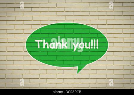 Thank you card. Speech balloon with words on brick wall Stock Photo