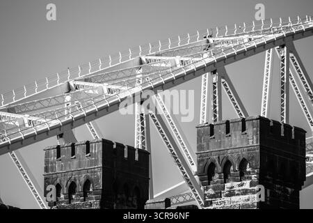 Black and white detail of the Silver Jubilee Bridge and railway viaduct towers Stock Photo