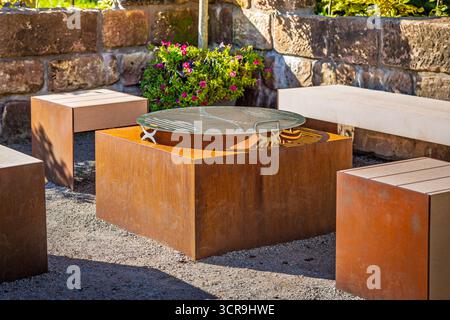 Modern seating area with a grill in backyard or patio Stock Photo