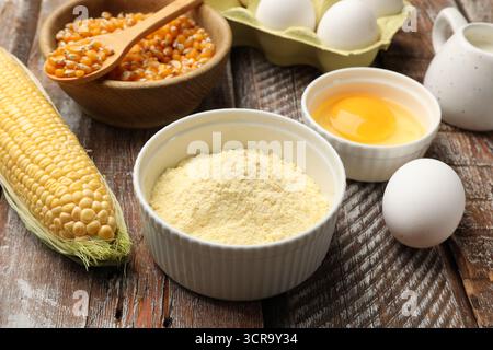 Making cornbread. Different ingredients on light blue wooden table, closeup Stock Photo