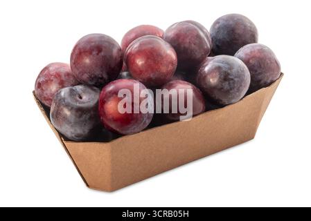 Plums in cardboard tray isolated on white  with clipping path included Stock Photo