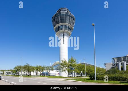 Munich, Germany - August 19, 2025: Air traffic control tower of Munich airport in Germany. Stock Photo