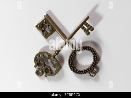 Vintage keys arranged on a flat surface Stock Photo