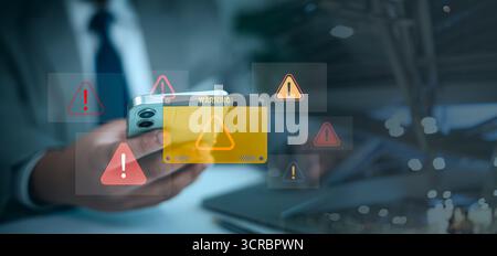 Mobile cybersecurity warning alert on smartphone screen. Concept of online threat, malware attack, phishing, digital risk, data protection and cyber s Stock Photo