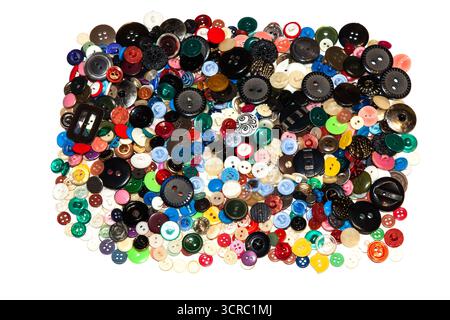 Multi-colored buttons on a white background close-up. Stock Photo