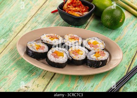 Koream homemade roll Kimbap with nori seaweed, sausages and vegetables Stock Photo