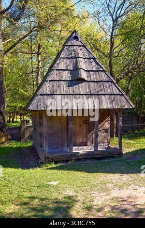 Image of an old wooden hut in the forest Stock Photo