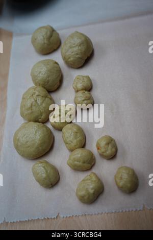 Unbaked dough portions, ready to be shaped into traditional Cretan Lazarakia. Capturing the essence of Lenten preparation for a symbolic Easter treat. Stock Photo