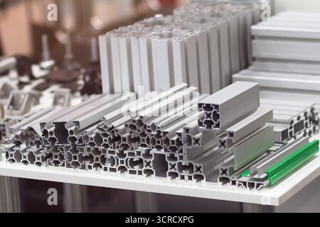 Aluminum extrusion profiles on the counter. Industry Stock Photo