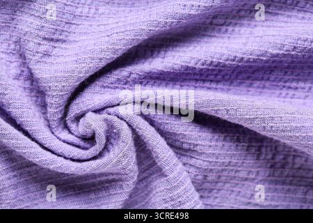 Crumpled violet muslin as background, closeup Stock Photo