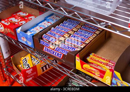 Los Angeles, California, United States - 07-22-2020: A view of a case of several Snickers candy bars, on display at a local grocery store. Stock Photo
