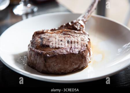 A view of a tomahawk steak. Stock Photo
