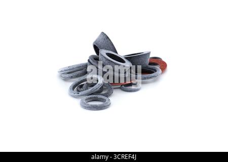 A collection of various rubber gaskets and seals, providing a diverse selection for industrial or mechanical uses, presented on a white background. Stock Photo