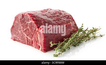 fresh raw beef meat with thyme isolated on white background Stock Photo