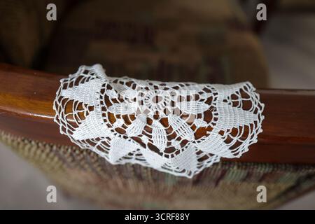 Shallow depth of field (selective focus) details with Romanian communist era Milieu (Mileu or macrame) decoration. Stock Photo