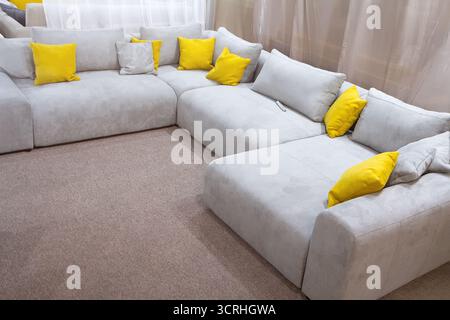 Interior of living room with yellow pillow in grey sofa. Decor Stock Photo