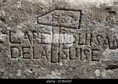 Stone Etched Engraving of Stonemasn's Hammer, dated 1787, on Road Bridge next to the Pont du Gard Bridge or Aqueduct Remoulins Gard France Stock Photo